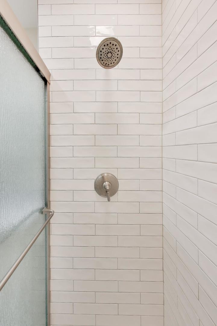 207 5th Street Wilmette, IL 60091 - Photo 18 of 30 a bathroom with a shower