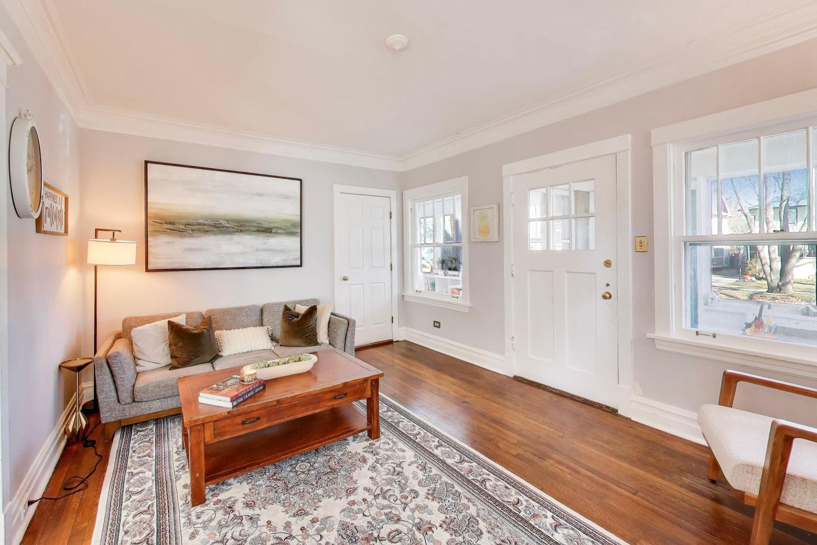 207 5th Street Wilmette, IL 60091 - Photo 6 of 30 a living room with furniture and wooden floor