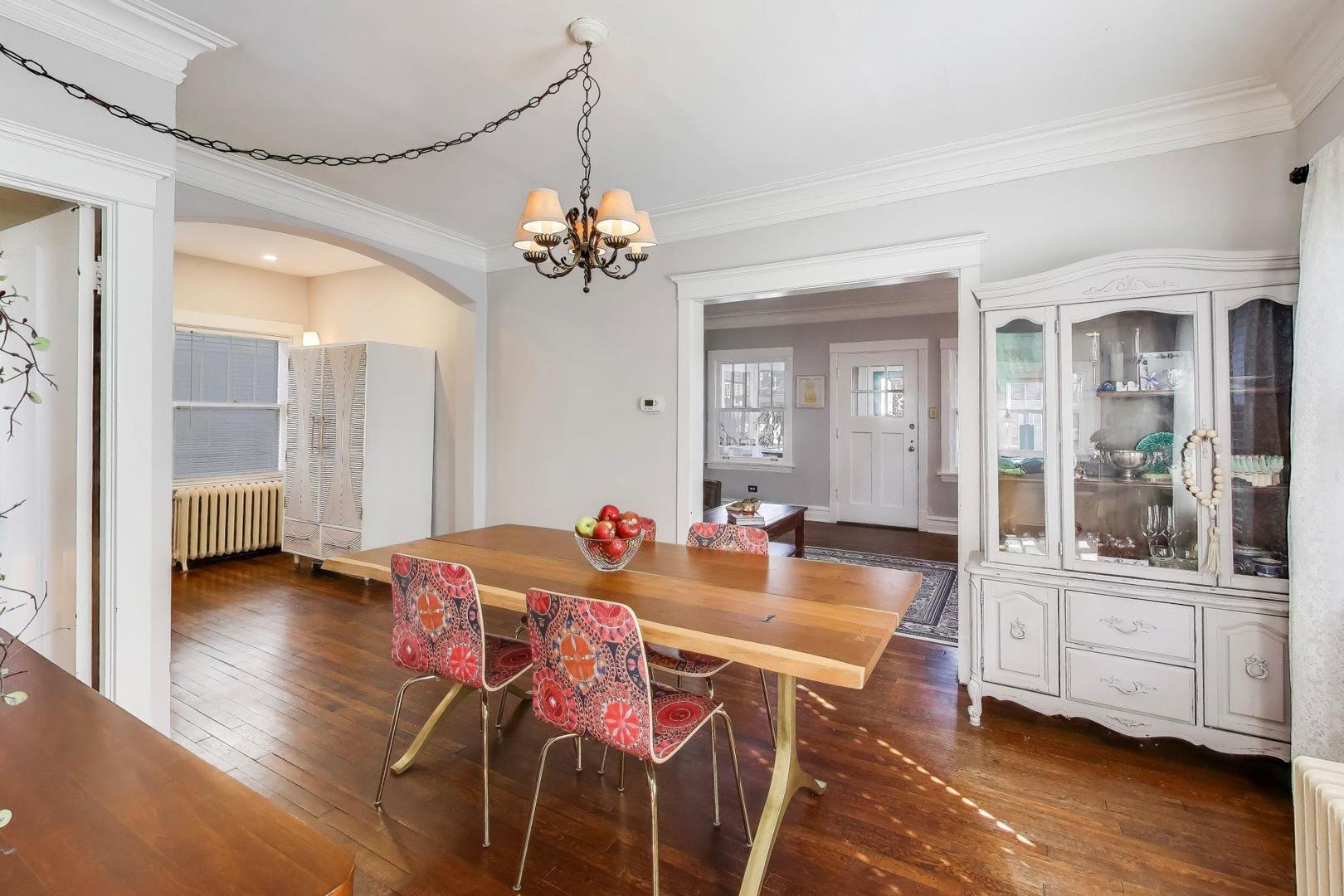 207 5th Street Wilmette, IL 60091 - Photo 9 of 30 a view of a dining room with furniture and wooden floor