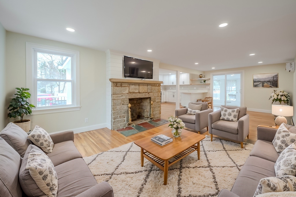 52 Bridge Street Billerica, MA 01821 - Photo 11 of 41 a living room with furniture fireplace and window
