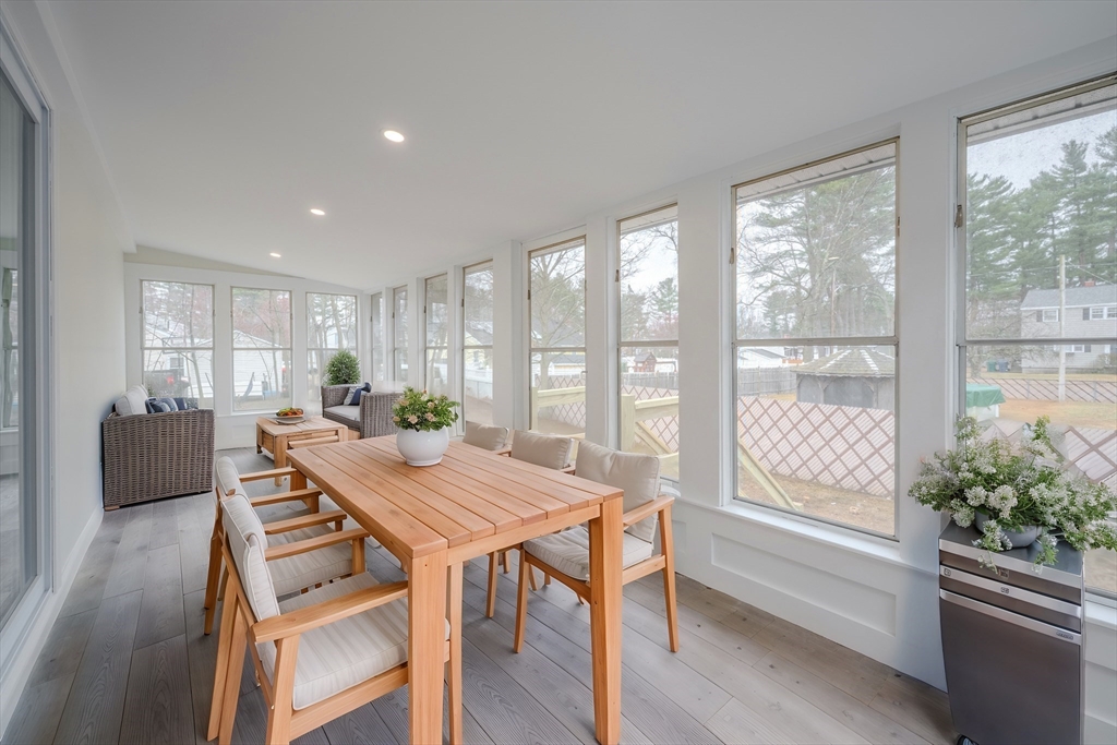 52 Bridge Street Billerica, MA 01821 - Photo 14 of 41 a view of a dining room with furniture window and wooden floor