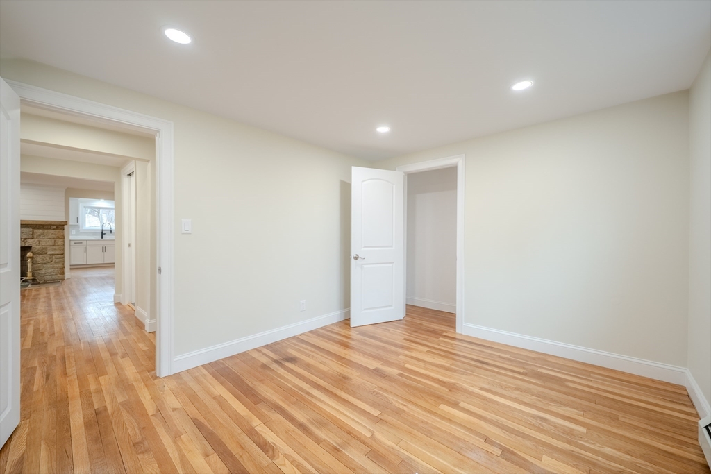 52 Bridge Street Billerica, MA 01821 - Photo 22 of 41 a view of a room with wooden floor