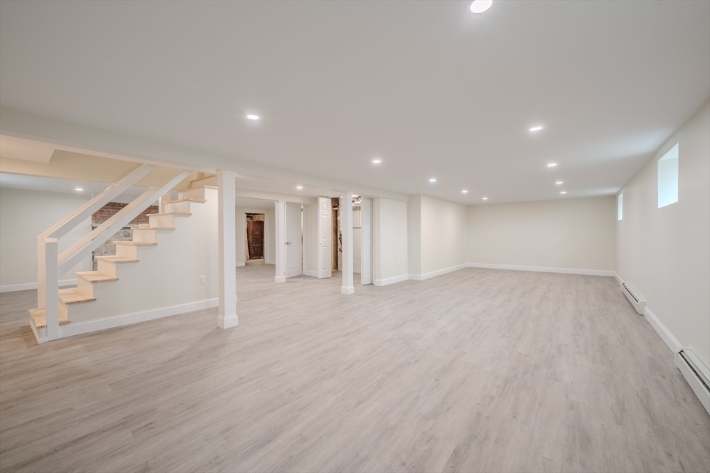 52 Bridge Street Billerica, MA 01821 - Photo 27 of 41 a view of empty room with wooden floor