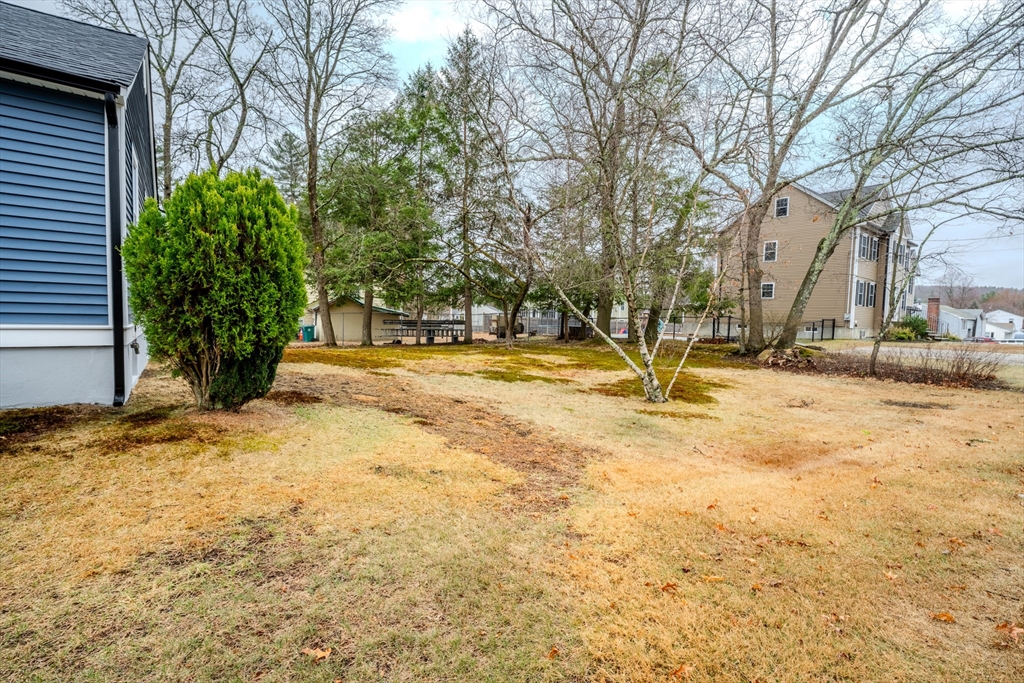 52 Bridge Street Billerica, MA 01821 - Photo 39 of 41 a view of outdoor space with trees