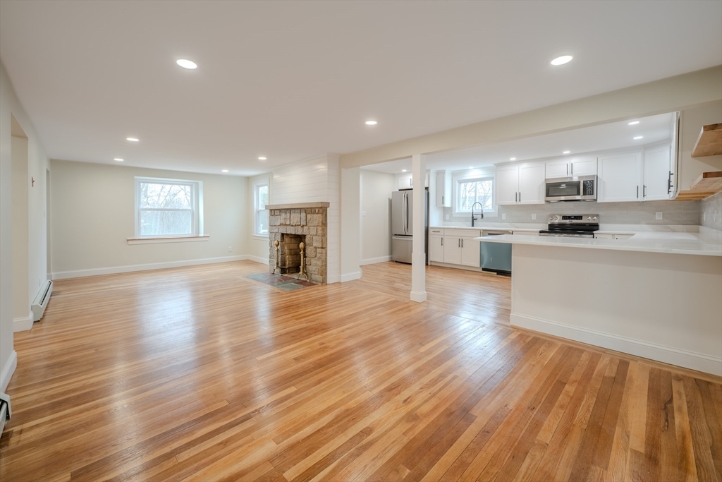 52 Bridge Street Billerica, MA 01821 - Photo 8 of 41 a view of kitchen with refrigerator sink and cabinets