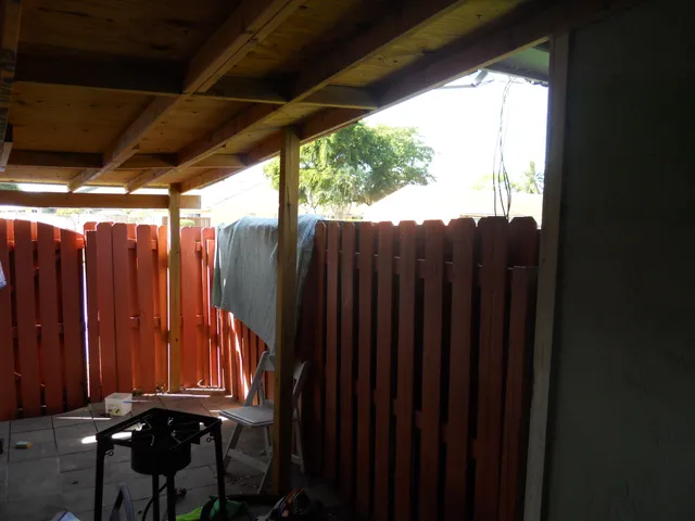 a view of sign board with a yard