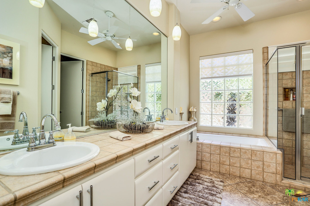 249 Loch Lomond Road Rancho Mirage, CA 92270 - Photo 24 of 48 Master Bath with 2 sinks, tub and shower