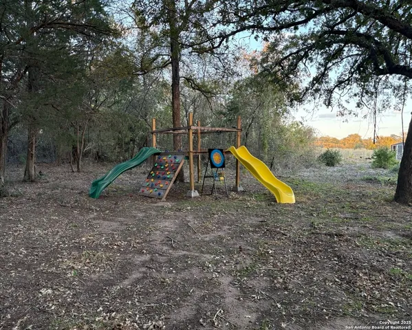 a view of a park with slide