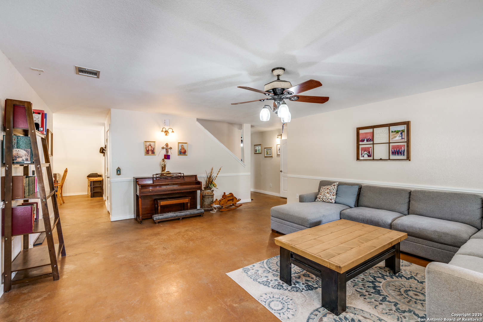 113 Pr 2013 Dale, TX 78616 - Photo 6 of 31 a living room with furniture and a chandelier
