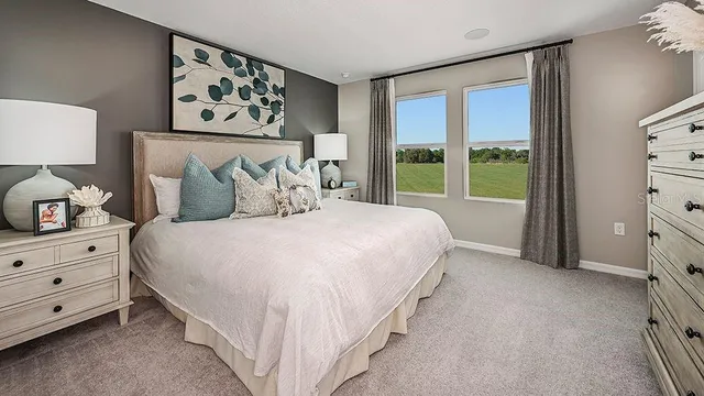a bathroom with a double vanity sink mirror and double