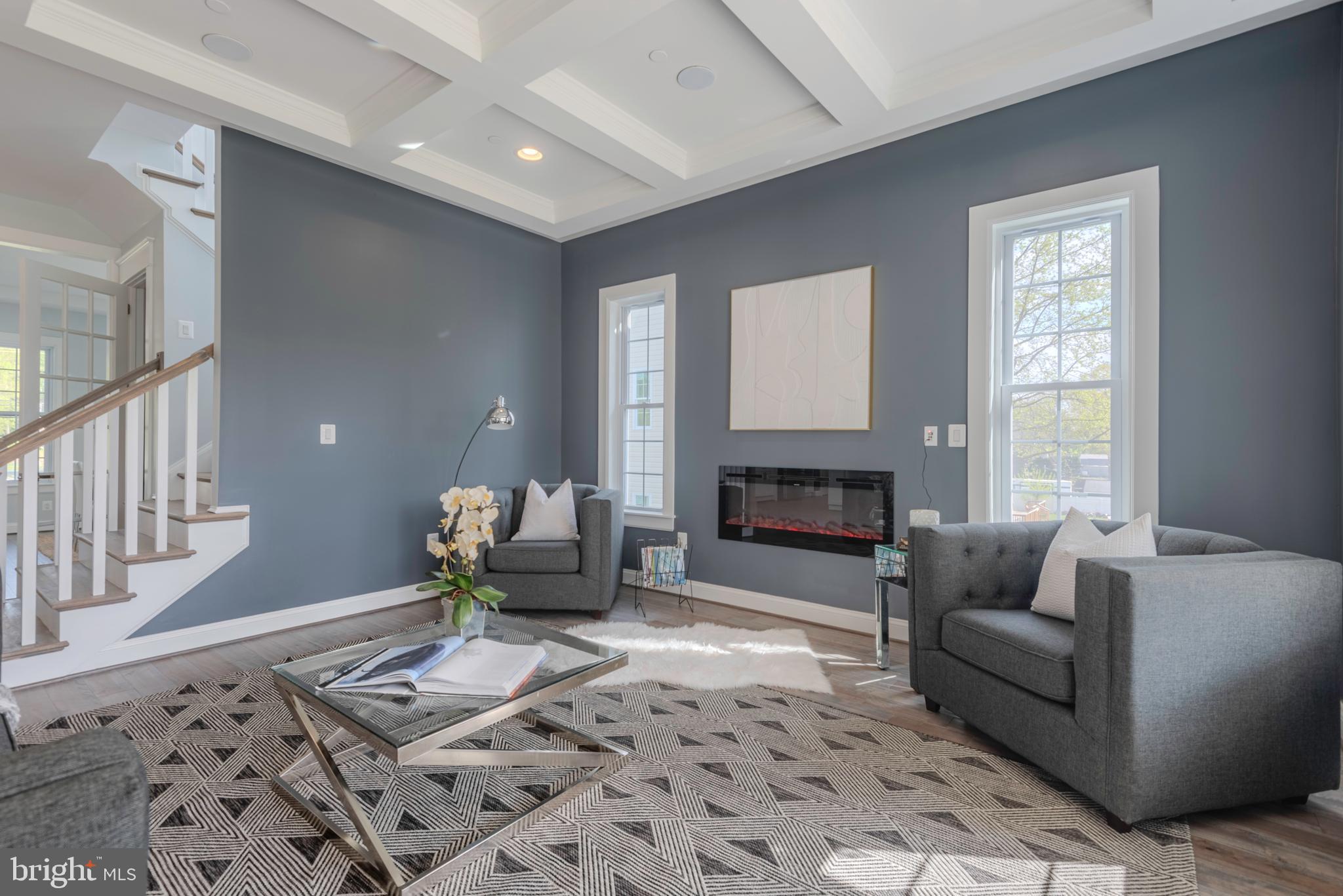 12603 Lanham Severn Road Bowie, MD 20720 - Photo 17 of 79 a living room with furniture and a fireplace