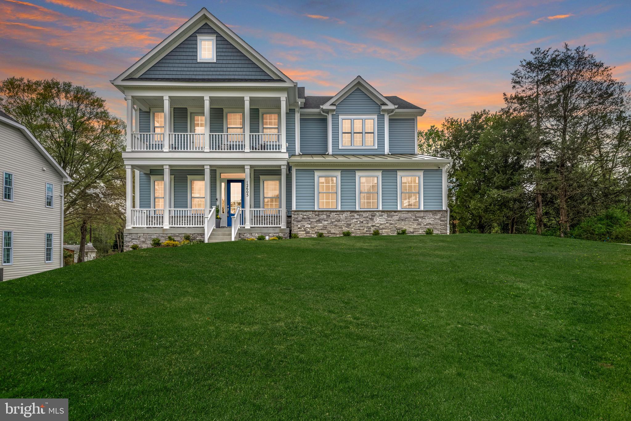 12603 Lanham Severn Road Bowie, MD 20720 - Photo 2 of 79 a front view of a house with a yard