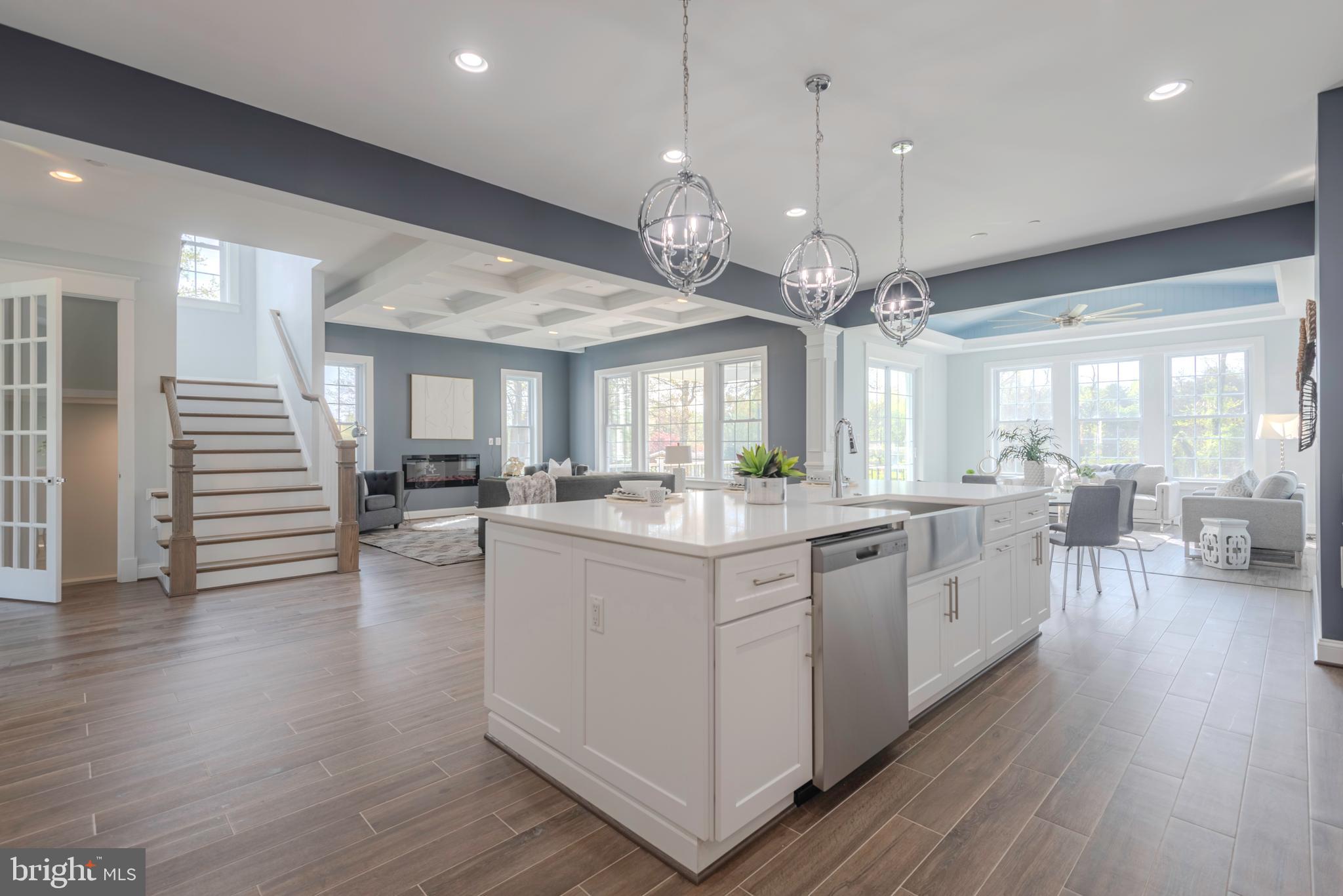 12603 Lanham Severn Road Bowie, MD 20720 - Photo 22 of 79 a large kitchen with lots of counter space wooden floor and appliances