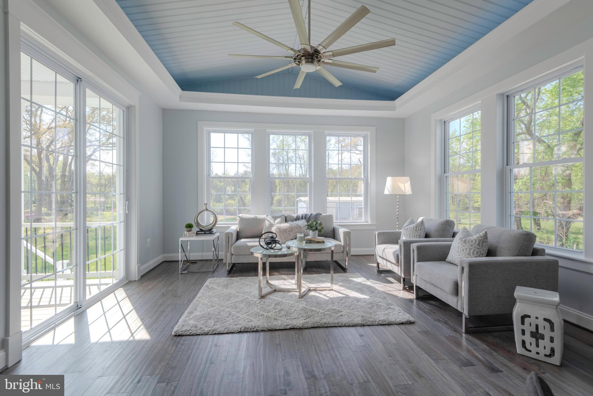 12603 Lanham Severn Road Bowie, MD 20720 - Photo 27 of 79 a living room with furniture and a large window