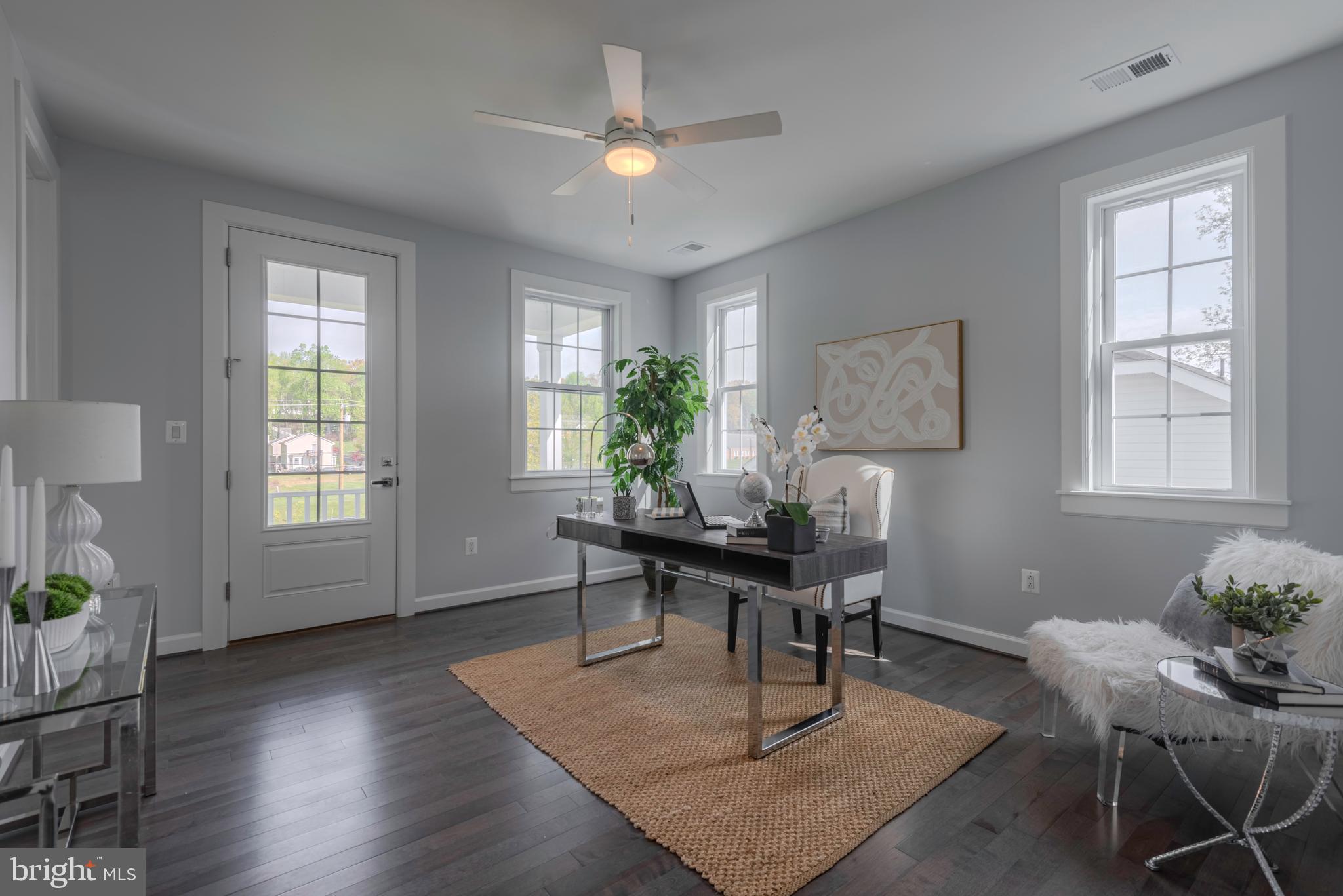 12603 Lanham Severn Road Bowie, MD 20720 - Photo 36 of 79 a workspace with wooden floor