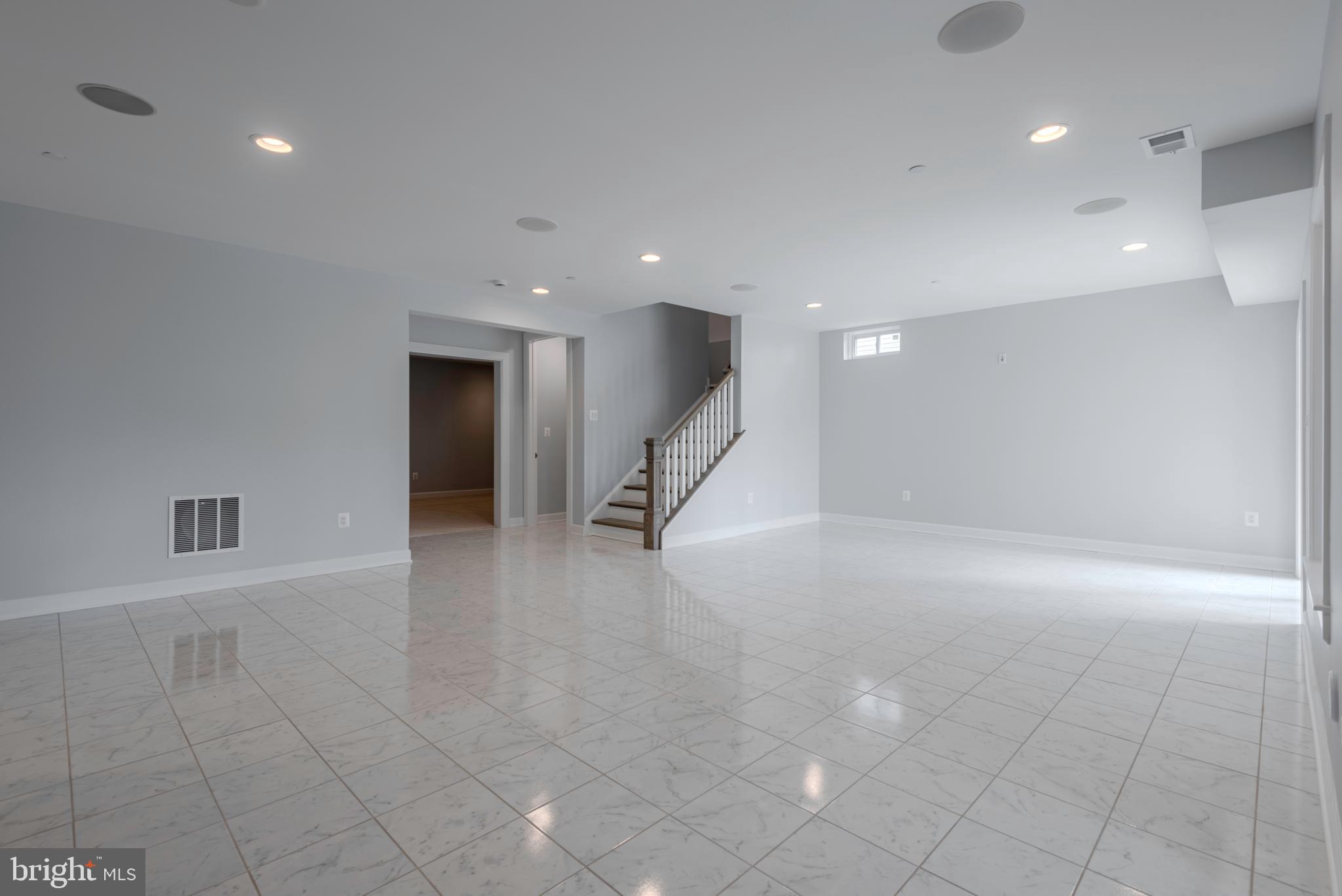 12603 Lanham Severn Road Bowie, MD 20720 - Photo 63 of 79 a view of an empty room with a window