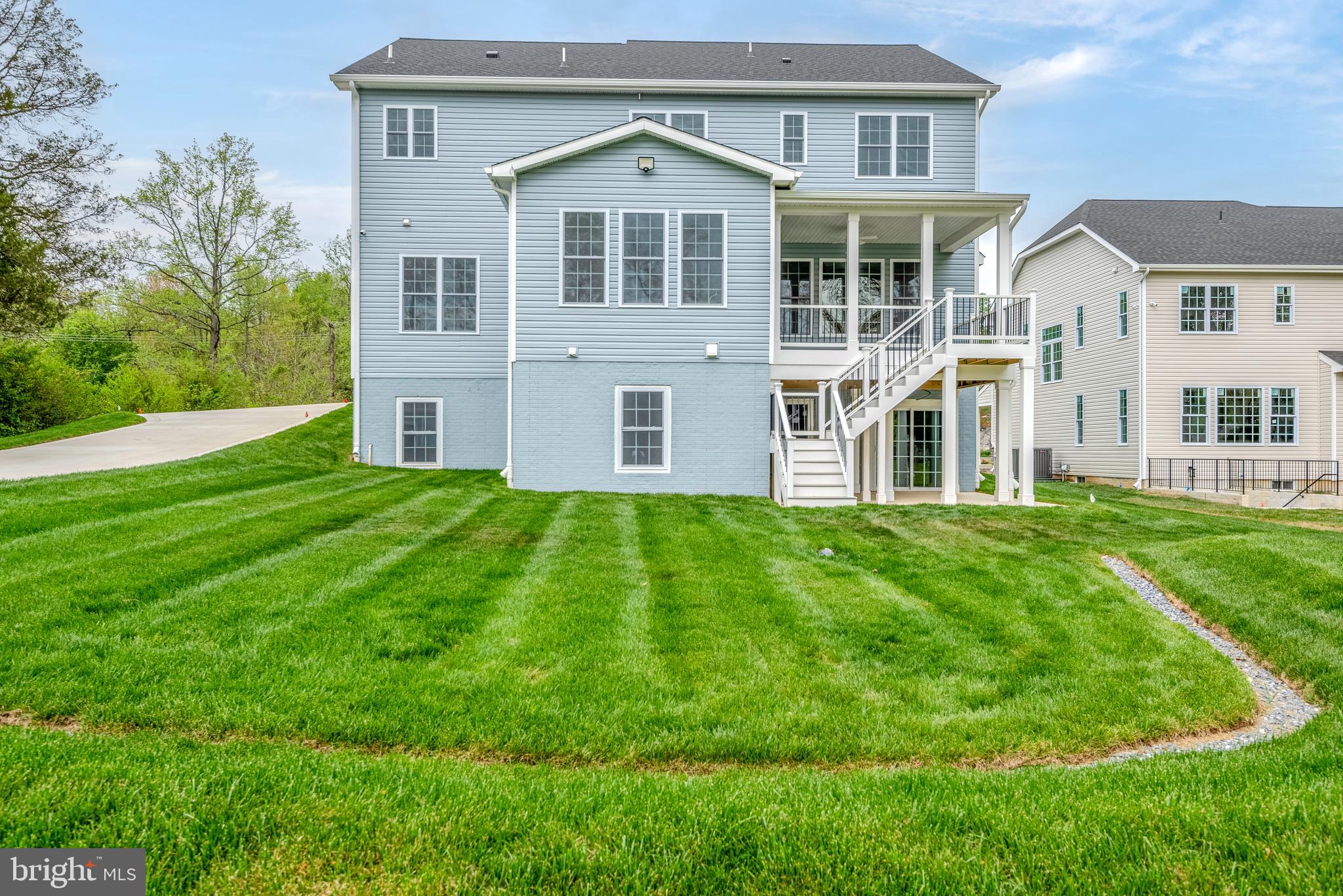 12603 Lanham Severn Road Bowie, MD 20720 - Photo 72 of 79 a front view of a house with a yard