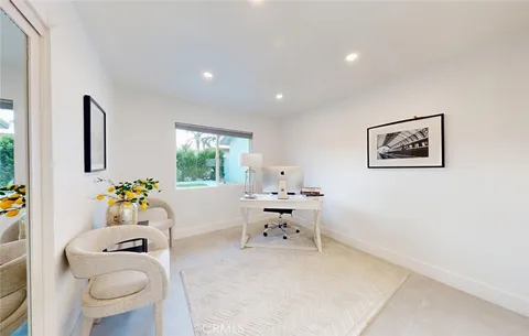 a bedroom with a large bed and a couch