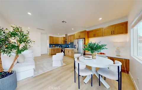 a bedroom with a bed and a lamp