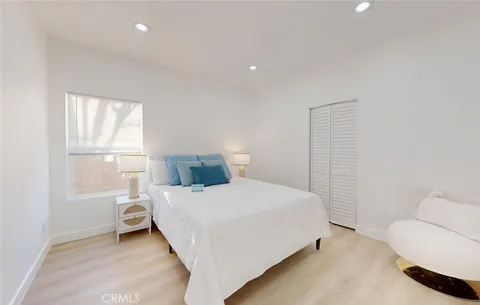 a kitchen with refrigerator a sink and cabinets