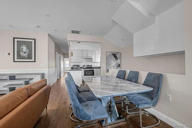 a view of a dining room with furniture