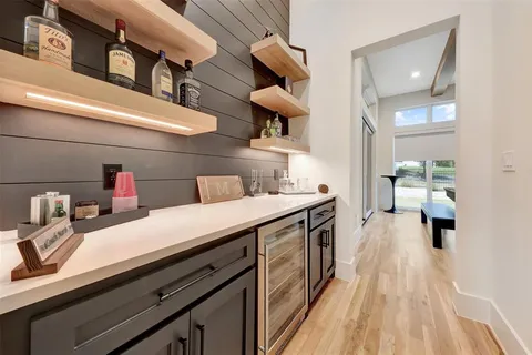 a kitchen with a sink cabinets and appliances