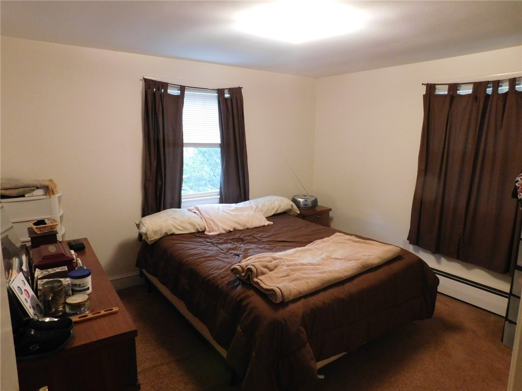 4 Mellon Road Warwick, RI 02889 - Photo 8 of 15 Bedroom with refinished hardwoods under 6 year old carpet.