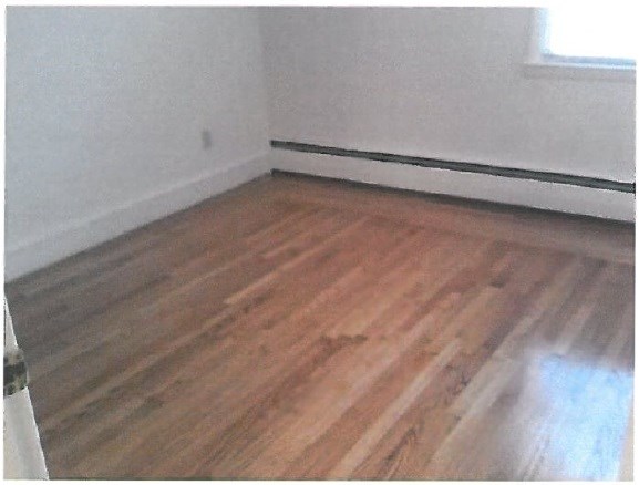 4 Mellon Road Warwick, RI 02889 - Photo 9 of 15 The Hardwood floors under carpet in living room and all bedrooms.