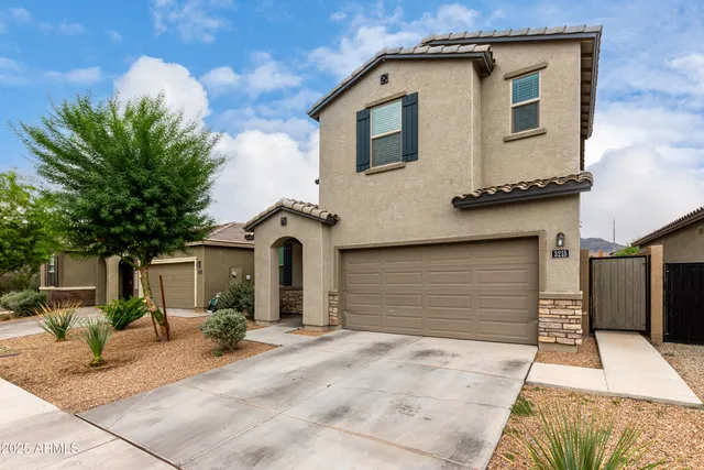 a view of a house with a patio