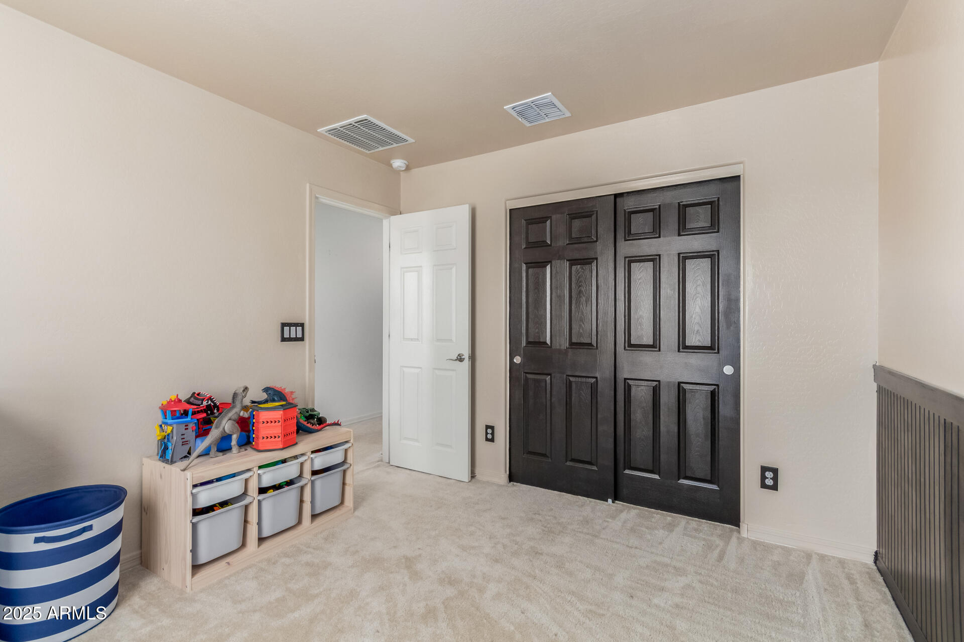 3215 West Pollack Street Phoenix, AZ 85041 - Photo 13 of 26 a livingroom with toys