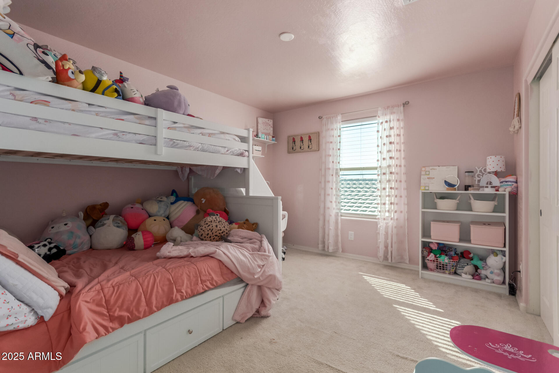 3215 West Pollack Street Phoenix, AZ 85041 - Photo 14 of 26 a bedroom with a bed and a window