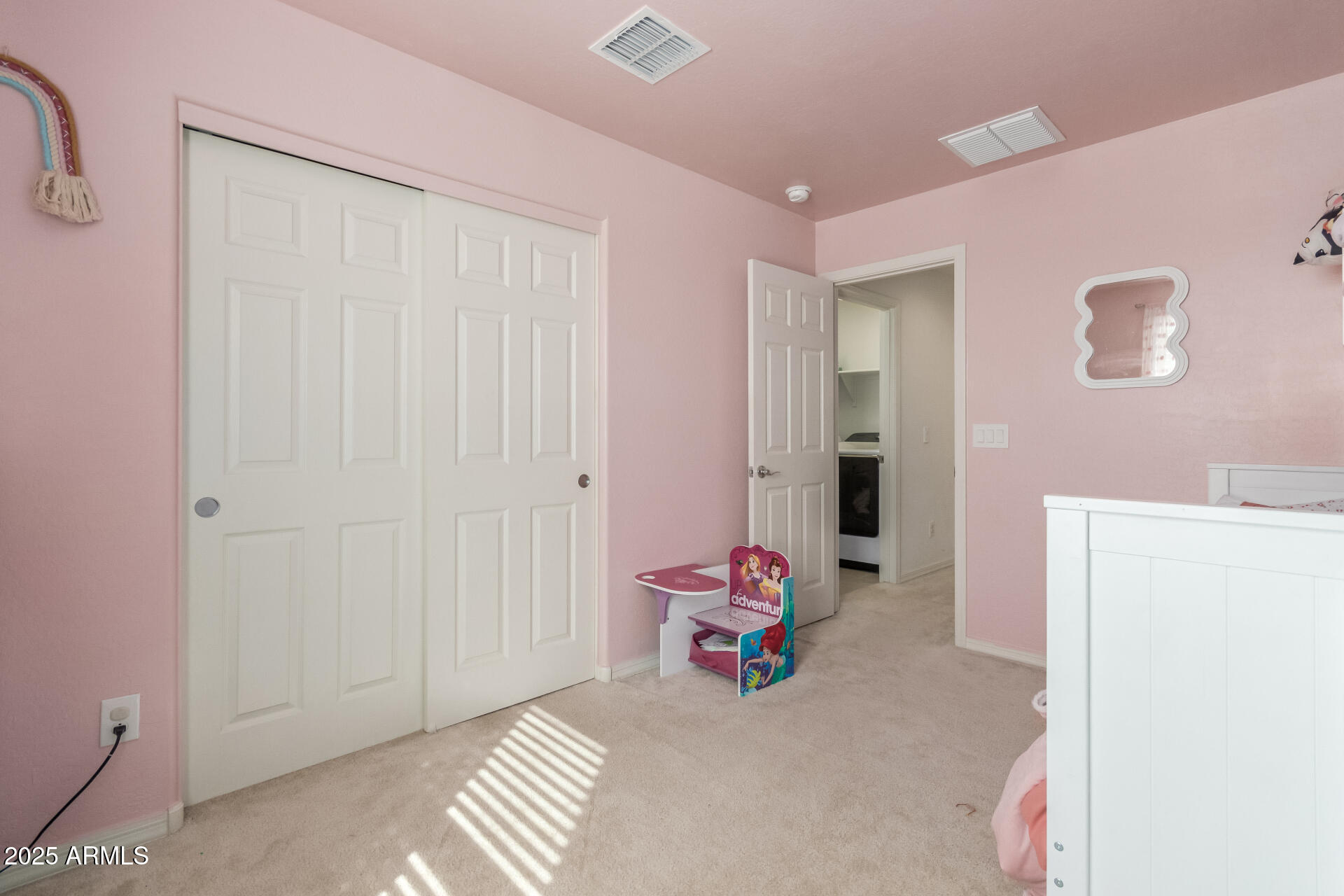 3215 West Pollack Street Phoenix, AZ 85041 - Photo 15 of 26 a view of a room with wooden floor and furniture