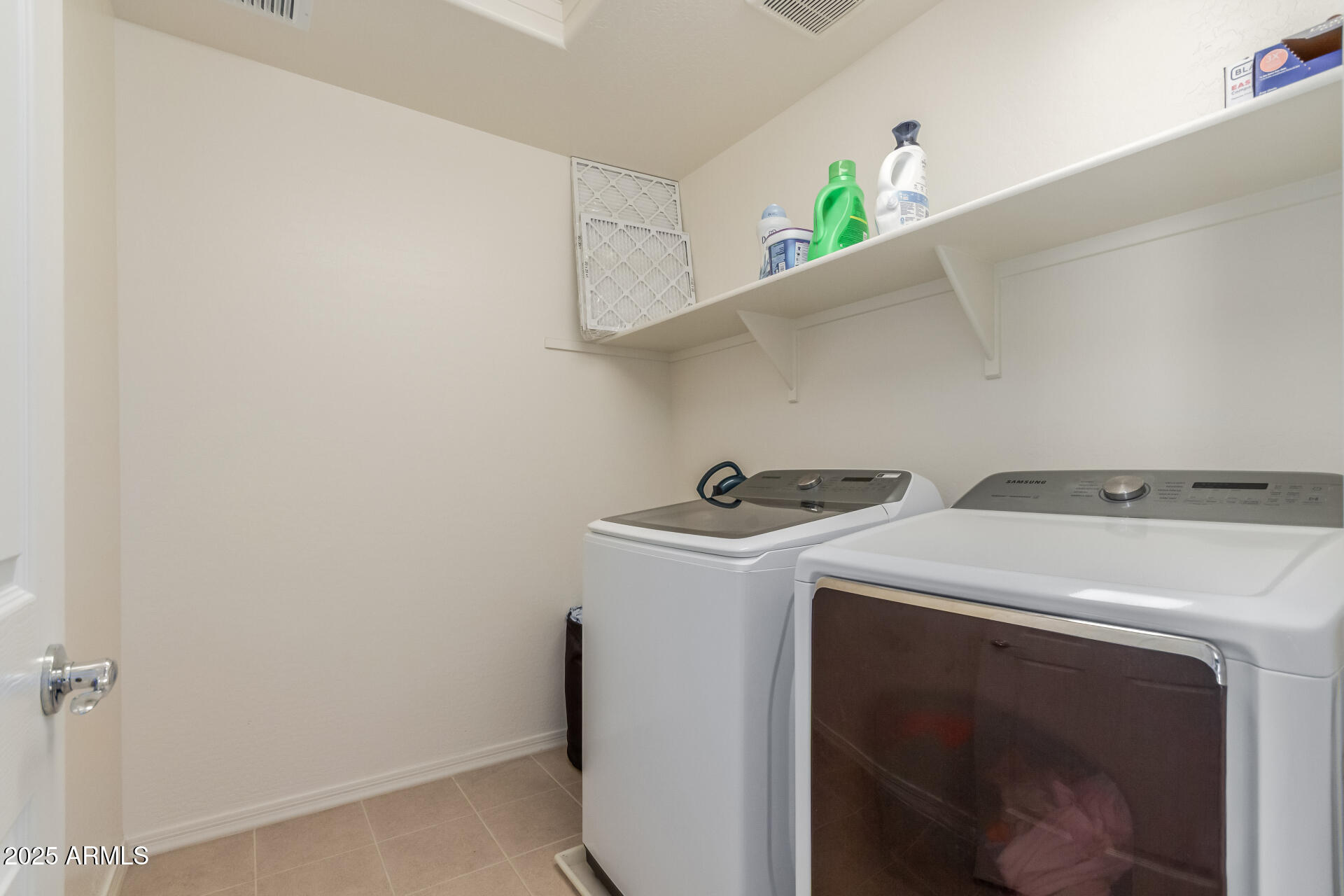 3215 West Pollack Street Phoenix, AZ 85041 - Photo 17 of 26 a utility room with dryer and washer