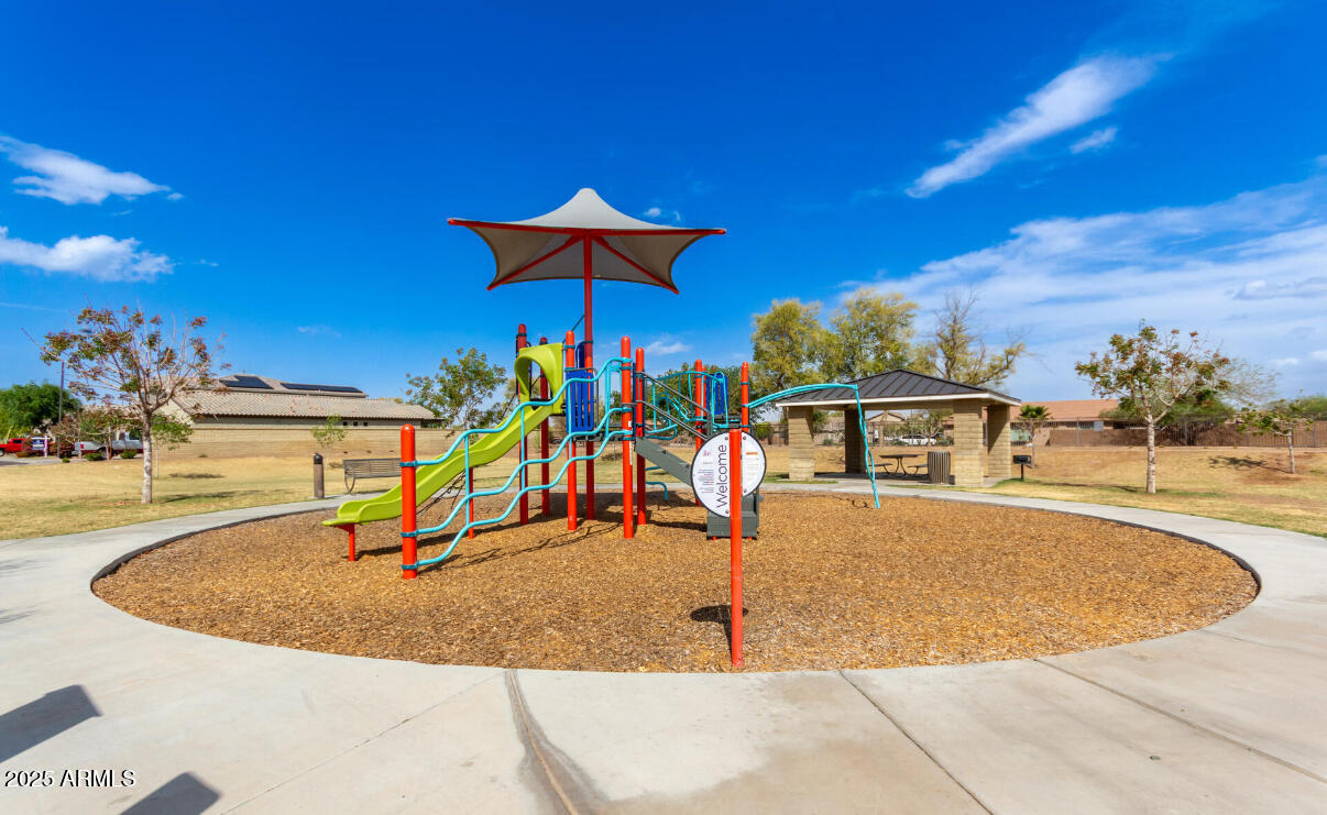 3215 West Pollack Street Phoenix, AZ 85041 - Photo 26 of 26 a view of a house with a swimming pool