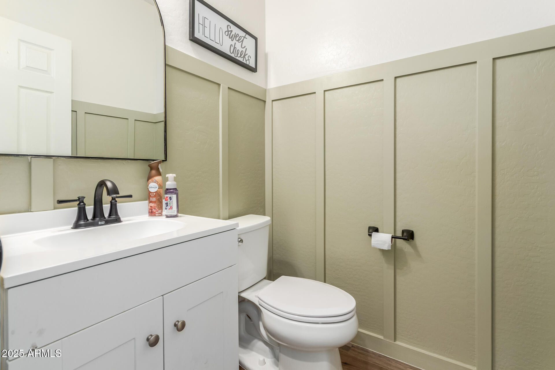 3215 West Pollack Street Phoenix, AZ 85041 - Photo 8 of 26 a bathroom with a sink a toilet and shower