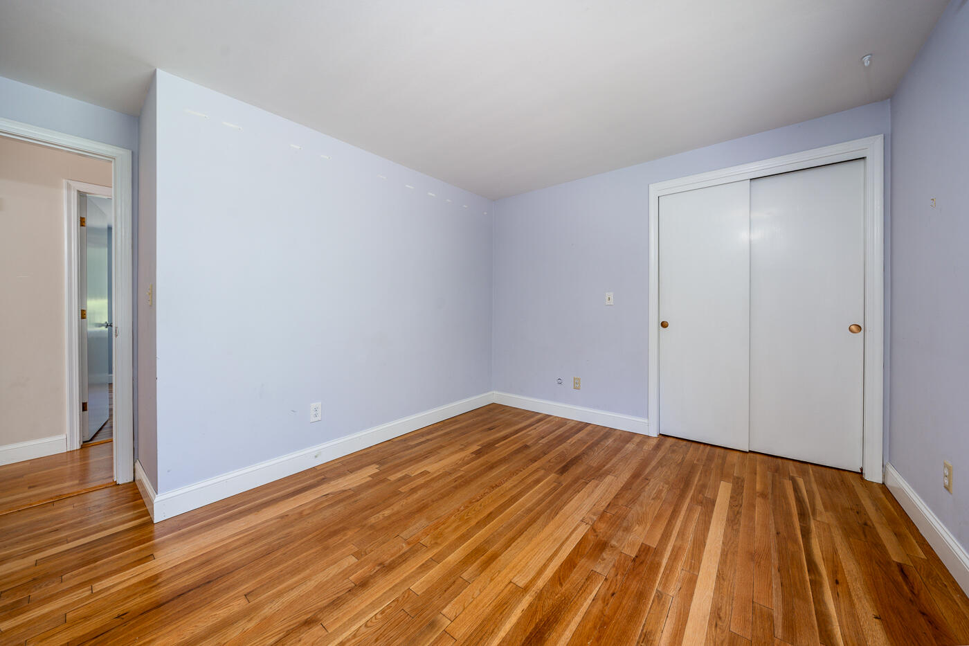 57 Holly Point Road Centerville, MA 02632 - Photo 18 of 41 a view of empty room with wooden floor