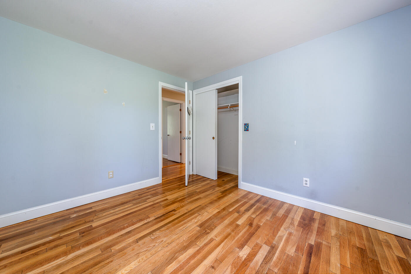 57 Holly Point Road Centerville, MA 02632 - Photo 22 of 41 a view of room with wooden floor