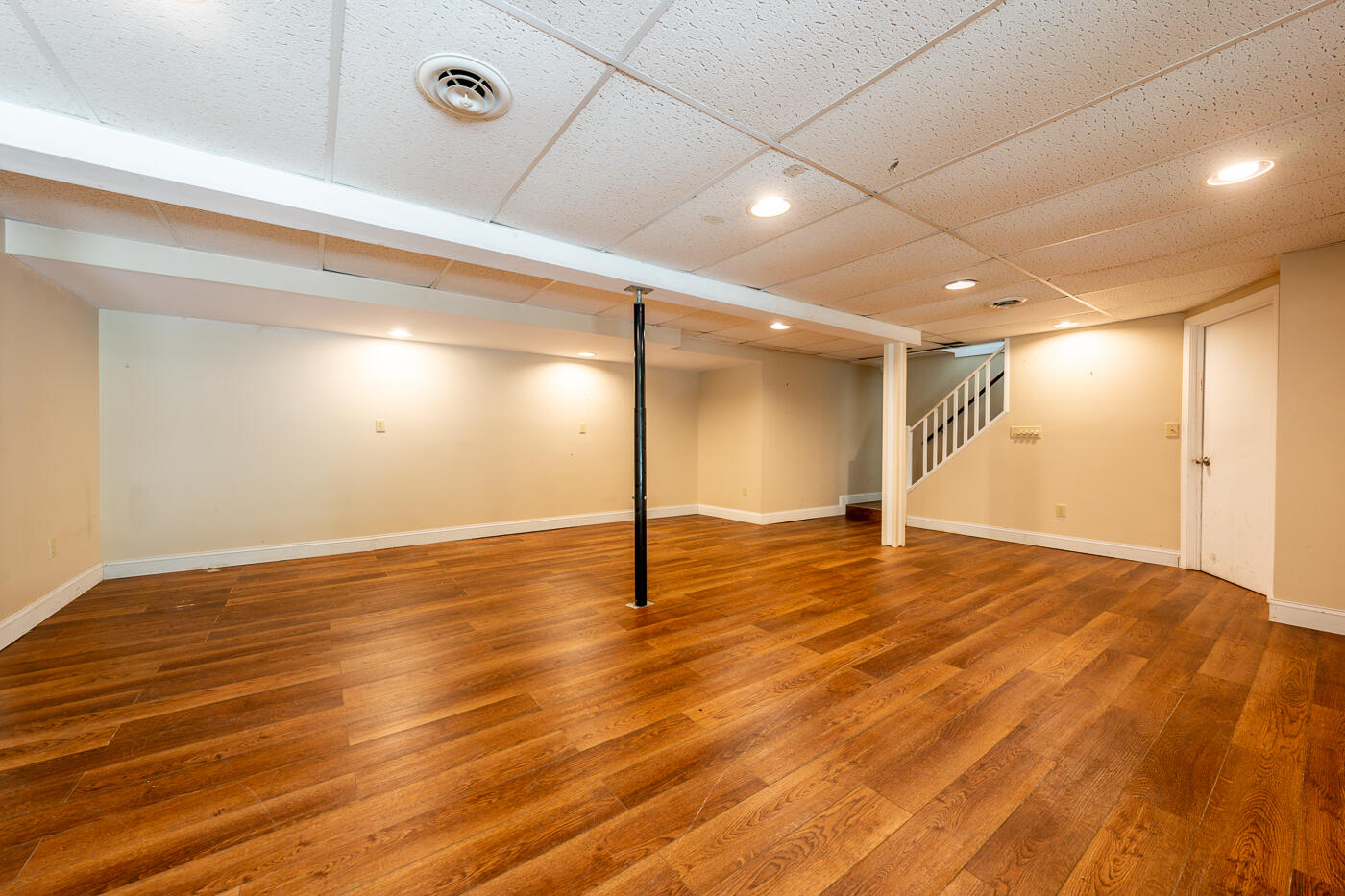 57 Holly Point Road Centerville, MA 02632 - Photo 25 of 41 a view of empty room with wooden floor