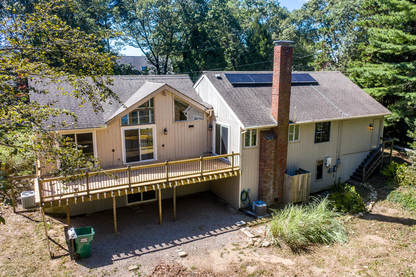 57 Holly Point Road Centerville, MA 02632 - Photo 31 of 41 a front view of a house with a garden