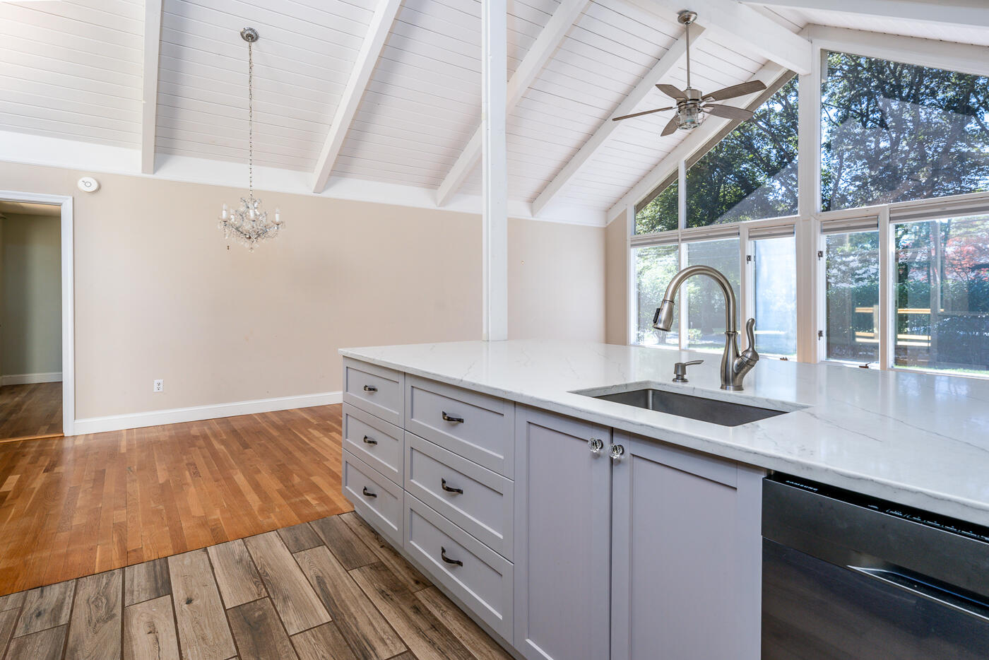 57 Holly Point Road Centerville, MA 02632 - Photo 8 of 41 a kitchen with a sink and wooden floor