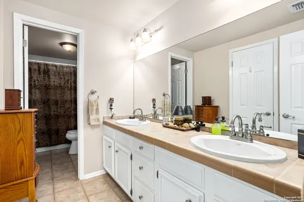 a view of a house with a street