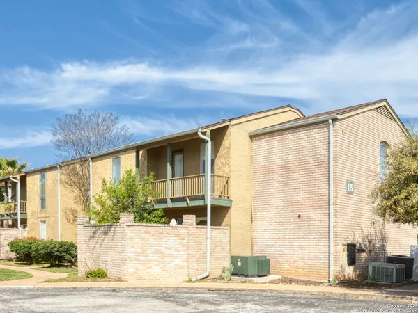 a view of house with outdoor space