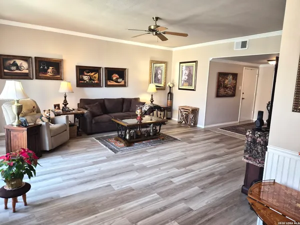 a view of a dining room with furniture and window