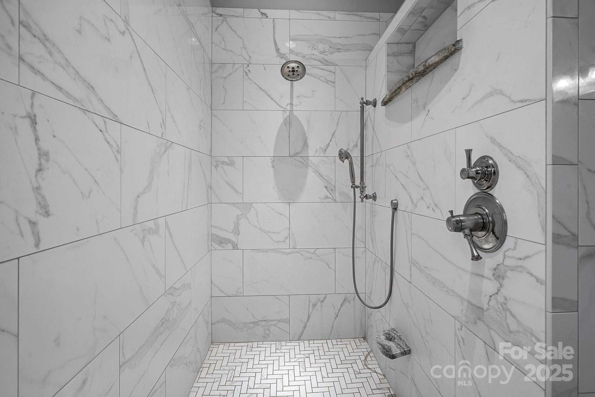 327 Kenway Loop Mooresville, NC 28117 - Photo 17 of 46 a bathroom with a glass shower