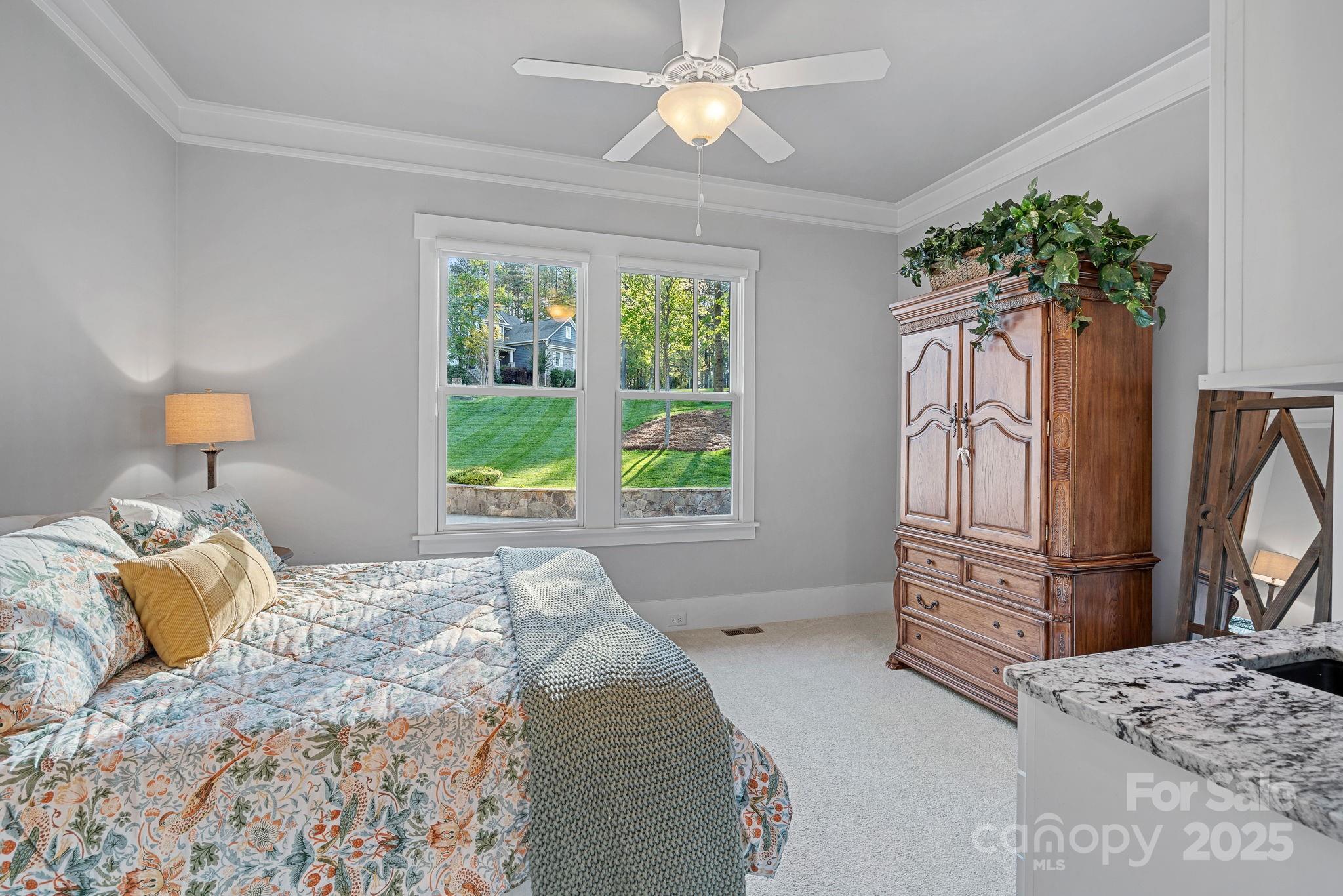 327 Kenway Loop Mooresville, NC 28117 - Photo 19 of 46 a bedroom with a bed and a window