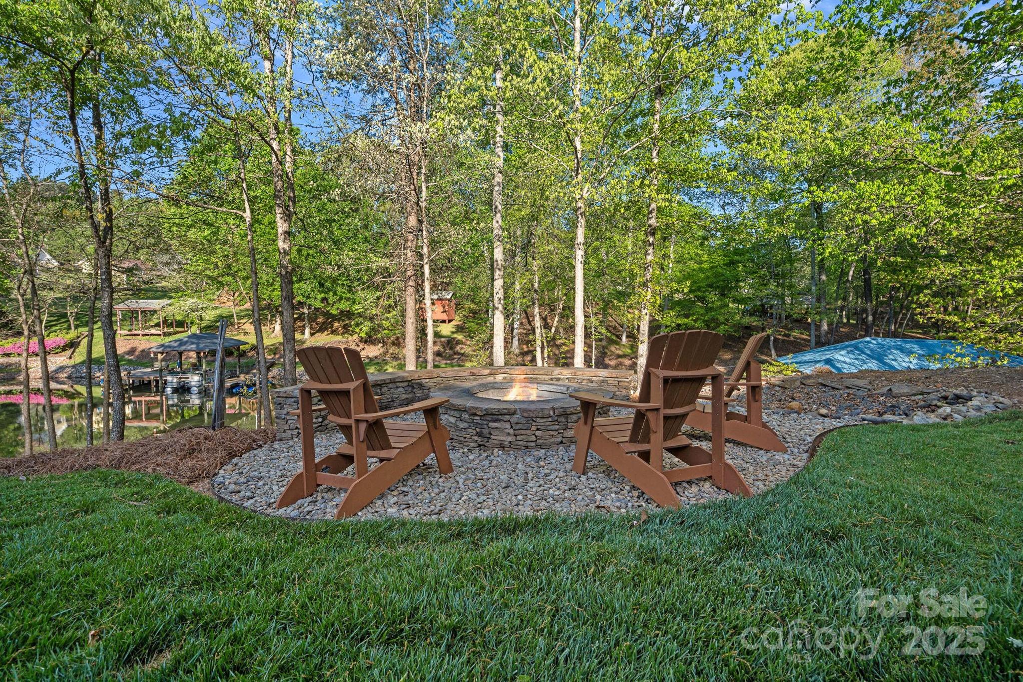 327 Kenway Loop Mooresville, NC 28117 - Photo 44 of 46 a view of a backyard with sitting area