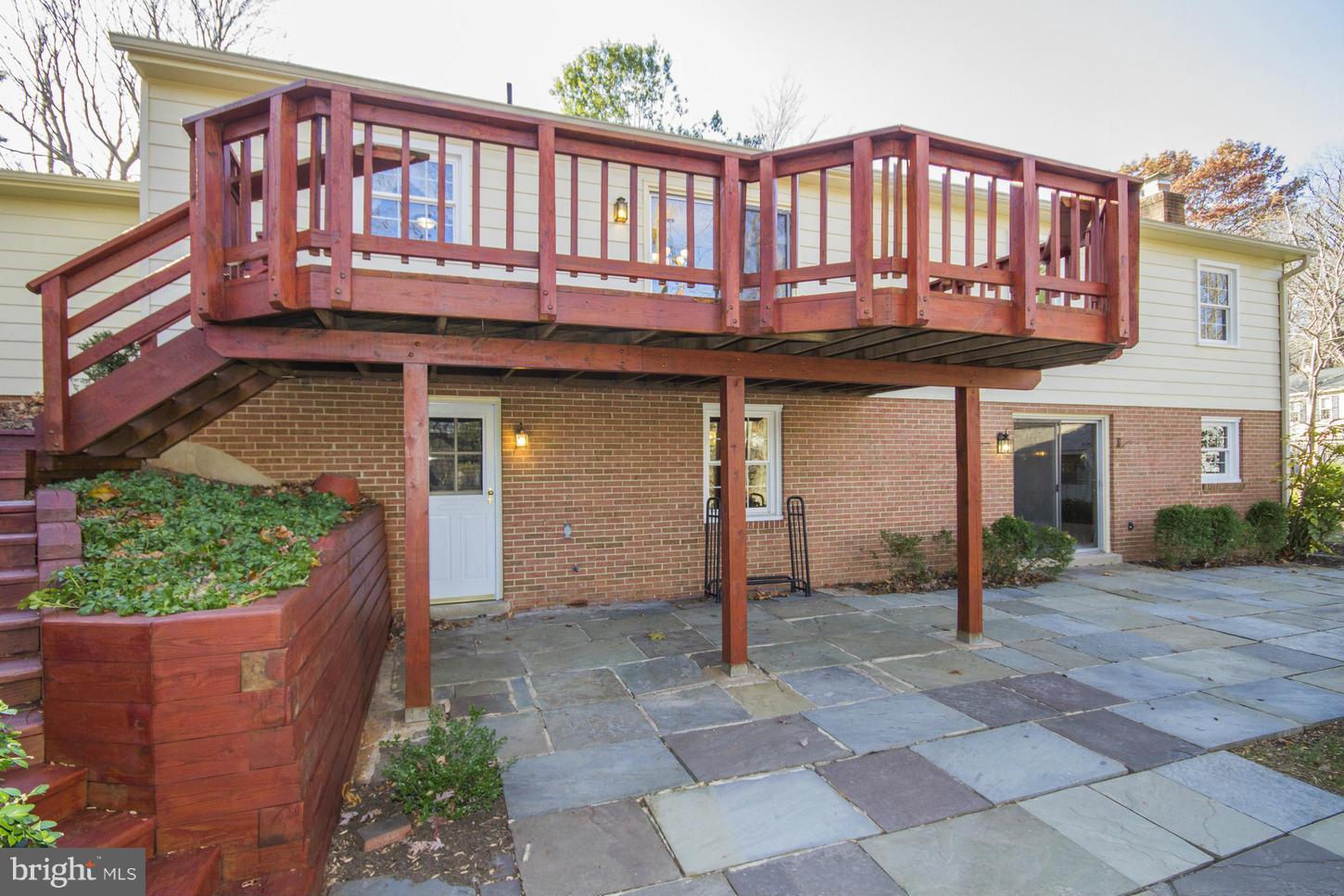 12208 St James Road Potomac, MD 20854 - Photo 27 of 29 a view of a house with a porch