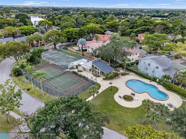 an aerial view of residential house with outdoor space