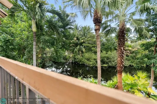 a view of a street from a balcony