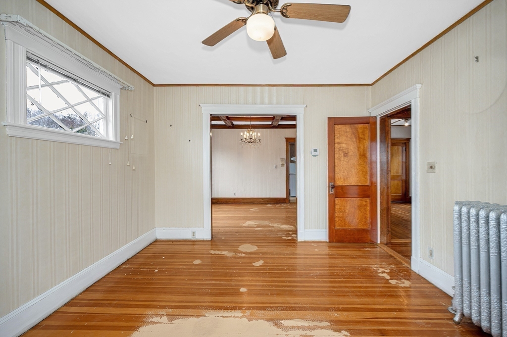481 Lagrange Street Boston, MA 02132 - Photo 6 of 32 a view of empty room with wooden floor
